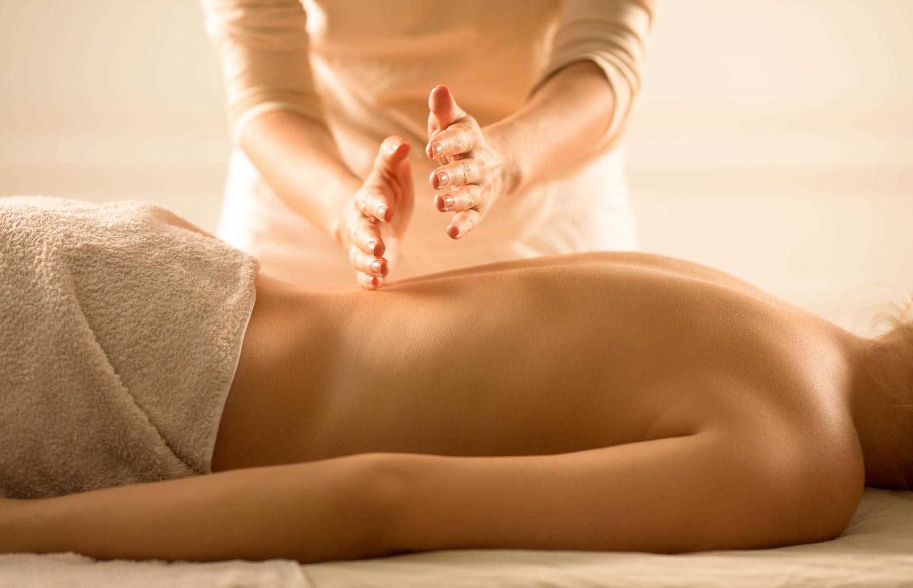 a woman getting a back massage